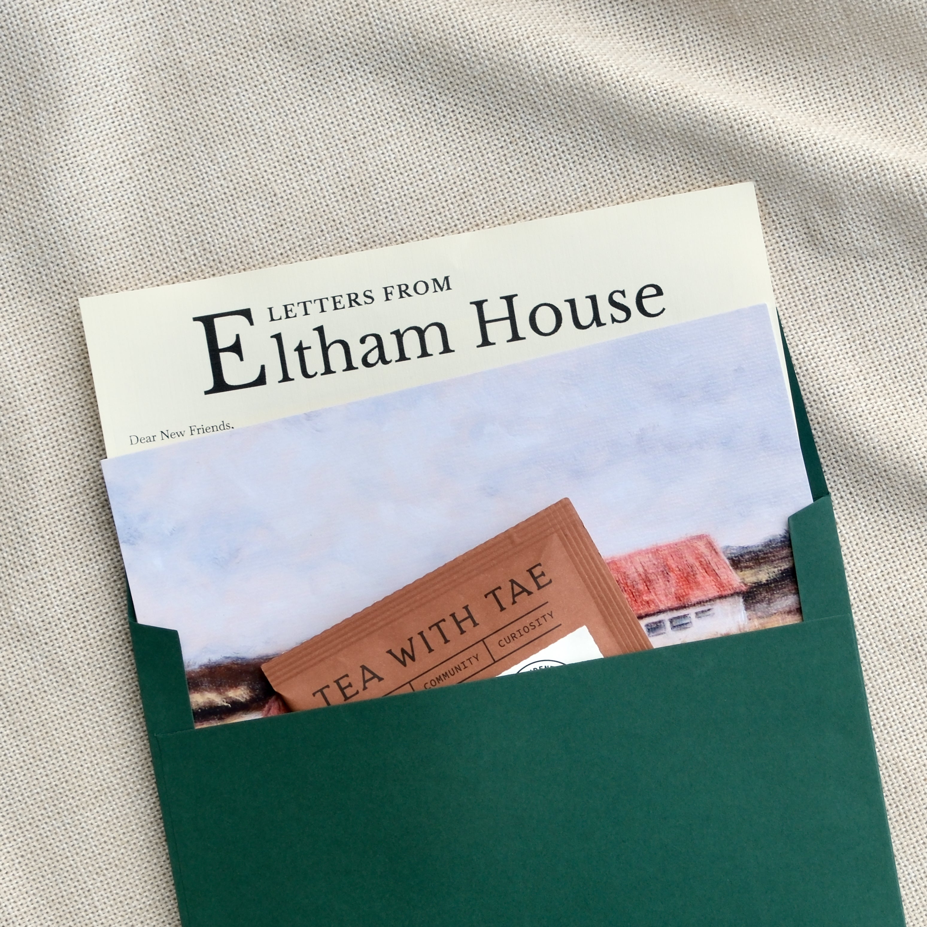 Letter from Eltham House, open envelope with letter, postcard and teabag.